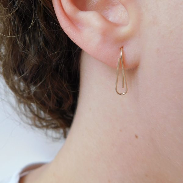 dolce earrings on model