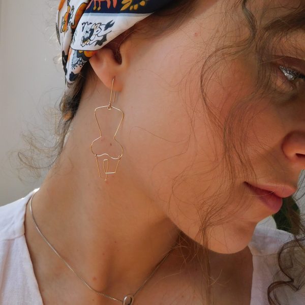self earrings on model