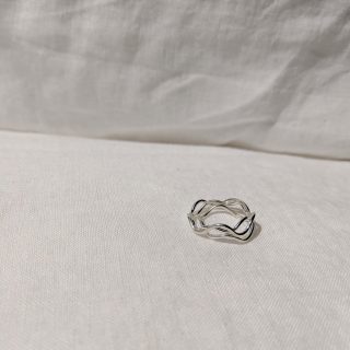 stack of silver wave rings