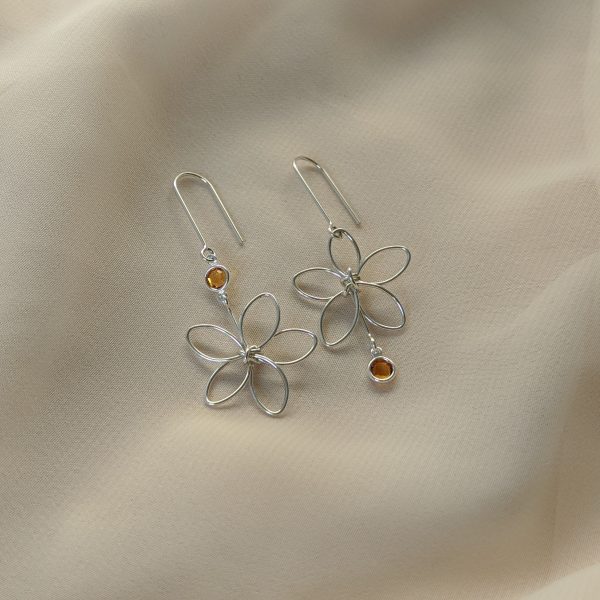 Silver flora earrings with yellow gem