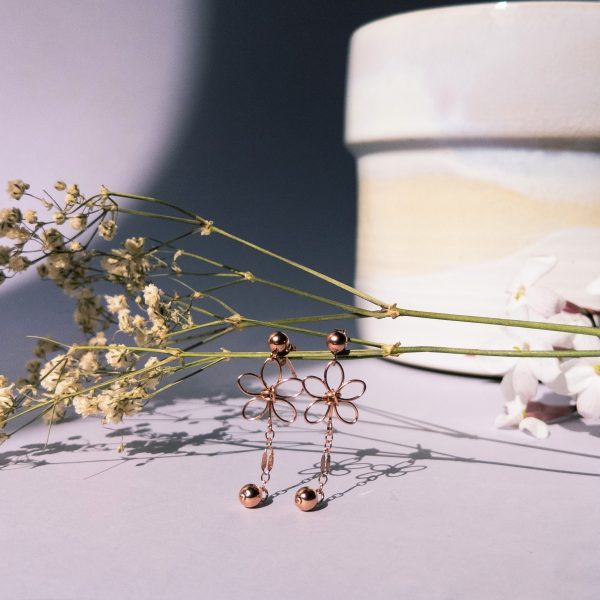 jasmine earrings on stem styled with pot